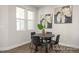 Cozy dining area featuring a round table and natural light, ideal for casual meals and gatherings at 3854 Well Fleet Drive, Fuquay Varina, NC 27526