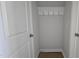 Entryway with hooks for hanging coats and organizing belongings, perfect for storage at 3854 Well Fleet Drive, Fuquay Varina, NC 27526