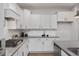 Modern kitchen with stainless steel appliances and plenty of counter space at 3854 Well Fleet Drive, Fuquay Varina, NC 27526