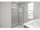 Modern bathroom featuring a glass-enclosed shower and bright natural light at 3860 Well Fleet Drive, Fuquay Varina, NC 27526