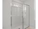 Walk-in shower featuring a glass door at 3860 Well Fleet Drive, Fuquay Varina, NC 27526