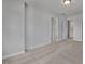 Spacious bedroom featuring neutral carpet, multiple closets, and adjacent bathroom at 3860 Well Fleet Drive, Fuquay Varina, NC 27526