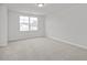 Neutral bedroom with carpet flooring and a window at 3860 Well Fleet Drive, Fuquay Varina, NC 27526