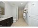 Modern bathroom featuring a glass-enclosed shower, granite vanity, and neutral tile at 400 W North St # 620, Raleigh, NC 27603