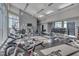 Bright, spacious gym with modern equipment and ample natural light at 400 W North St # 620, Raleigh, NC 27603