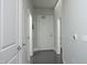 Bright hallway features gray floors, white doors, and a sleek, modern design at 400 W North St # 620, Raleigh, NC 27603