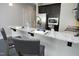 Modern kitchen with granite countertops, stainless steel appliances, and bar seating at 400 W North St # 620, Raleigh, NC 27603