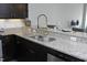 Kitchen featuring stainless steel appliances, granite countertops, and a modern faucet at 400 W North St # 620, Raleigh, NC 27603