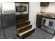 Stylish kitchen showing open drawers, stainless steel appliances, and ample counter space at 400 W North St # 620, Raleigh, NC 27603