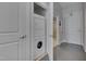 A convenient, stacked washer and dryer are in a closet in the unit's hallway at 400 W North St # 620, Raleigh, NC 27603