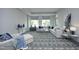 Open living room featuring a plush sectional sofa, stylish rug, and large windows at 400 W North St # 620, Raleigh, NC 27603
