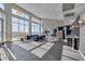 Expansive lounge featuring a sleek kitchenette, and comfortable seating with city views at 400 W North St # 620, Raleigh, NC 27603