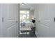 View of the main bedroom from the doorway, featuring a large window with a mural at 400 W North St # 620, Raleigh, NC 27603