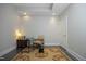 Cozy office space with dark floors, recessed lighting, and a comfortable chair at 400 W North St # 620, Raleigh, NC 27603