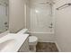 Clean bathroom with a shower/tub combo and white vanity at 4109 Mangrove Dr, Raleigh, NC 27616