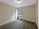 Simple bedroom with neutral walls and carpet at 4109 Mangrove Dr, Raleigh, NC 27616