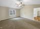 Large bedroom with vaulted ceiling and window at 4109 Mangrove Dr, Raleigh, NC 27616