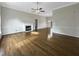 Spacious living room with hardwood floors and a fireplace at 4109 Mangrove Dr, Raleigh, NC 27616