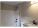 Bathroom featuring a tub, shower, granite countertop and vanity at 412 N Cooper St, Clayton, NC 27520