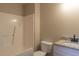Clean bathroom with a shower/tub combo, toilet, and vanity at 412 N Cooper St, Clayton, NC 27520