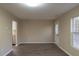 Dining area with hardwood floors, and access to kitchen at 412 N Cooper St, Clayton, NC 27520
