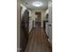 Modern kitchen with stainless steel appliances and white cabinets at 412 N Cooper St, Clayton, NC 27520