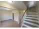 View of staircase and hardwood floors leading to upper level at 412 N Cooper St, Clayton, NC 27520