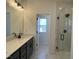 Bathroom features double sinks, modern fixtures, and a glass enclosed shower at 4318 Emeline Ln # 20, Fuquay Varina, NC 27526