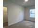 Bedroom with plush carpeting and natural light at 4318 Emeline Ln # 20, Fuquay Varina, NC 27526