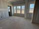 Unfinished bedroom with large windows and backyard view at 4318 Emeline Ln # 20, Fuquay Varina, NC 27526