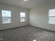 Bedroom with plush carpeting and natural light at 4318 Emeline Ln # 20, Fuquay Varina, NC 27526