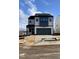 New two-story home with modern design, gray tones, and two-car garage at 4318 Emeline Ln # 20, Fuquay Varina, NC 27526