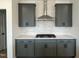 Modern kitchen featuring stainless steel appliances, subway tile backsplash, and custom cabinets at 4318 Emeline Ln # 20, Fuquay Varina, NC 27526