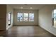 Bright living room featuring hardwood floors and natural light at 4318 Emeline Ln # 20, Fuquay Varina, NC 27526