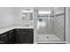 Bathroom features a large shower and corner vanity with marble top at 5120 Tallwood Dr, Raleigh, NC 27613