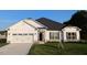 Beautiful traditional house with a two-car garage, a white siding, and well-manicured lawn and landscaping at 565 Sweet Potato Lane # 07, Nashville, NC 27856