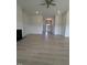 Open living room featuring a fireplace, hardwood floors, recessed lighting, and plenty of space for furnishings at 565 Sweet Potato Lane # 07, Nashville, NC 27856
