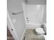 Clean bathroom with a shower/tub combo and tile flooring at 610 Lockwood Dr, Clayton, NC 27527