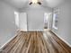 Spacious bedroom with hardwood floors and access to a full bathroom at 610 Lockwood Dr, Clayton, NC 27527