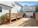 Backyard featuring a wood deck and storage shed at 700 Coleman St, Raleigh, NC 27610
