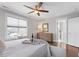 Bedroom featuring hardwood floors, a large window, and a bathroom at 700 Coleman St, Raleigh, NC 27610