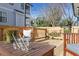 Charming wooden deck with cozy seating arrangement perfect for entertaining at 700 Coleman St, Raleigh, NC 27610