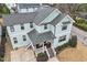 Beautiful two-story home boasts a covered porch and well-manicured landscaping, creating great curb appeal at 700 Coleman St, Raleigh, NC 27610