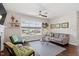 Cozy living room with ample natural light, stylish furniture, and hardwood floors at 700 Coleman St, Raleigh, NC 27610