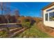 Stone steps leading to a landscaped backyard area at 7845 Hasentree Lake Dr, Wake Forest, NC 27587