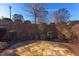 Stone patio in a landscaped backyard setting at 7845 Hasentree Lake Dr, Wake Forest, NC 27587