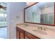 Double vanity bathroom with a large mirror at 7845 Hasentree Lake Dr, Wake Forest, NC 27587