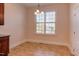 Breakfast nook with tile floors and large window with plantation shutters at 7845 Hasentree Lake Dr, Wake Forest, NC 27587