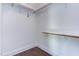 Spacious closet with wood shelving and hanging rods at 7845 Hasentree Lake Dr, Wake Forest, NC 27587