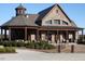Community clubhouse with stone exterior and large windows at 7845 Hasentree Lake Dr, Wake Forest, NC 27587